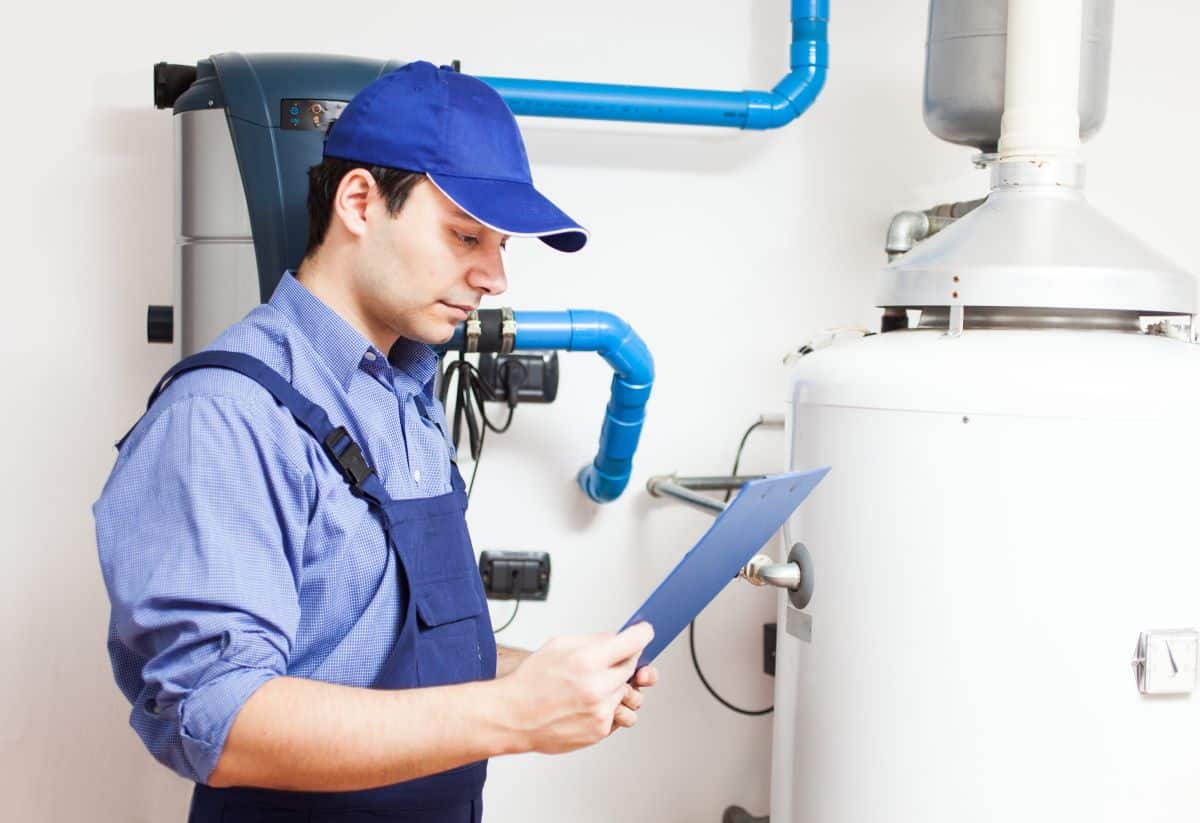 Technician servicing a hot water heater in Sparks, Nevada