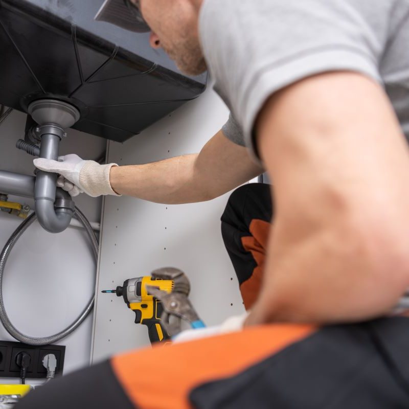 Plumber repairing pipes in Reno, Nevada